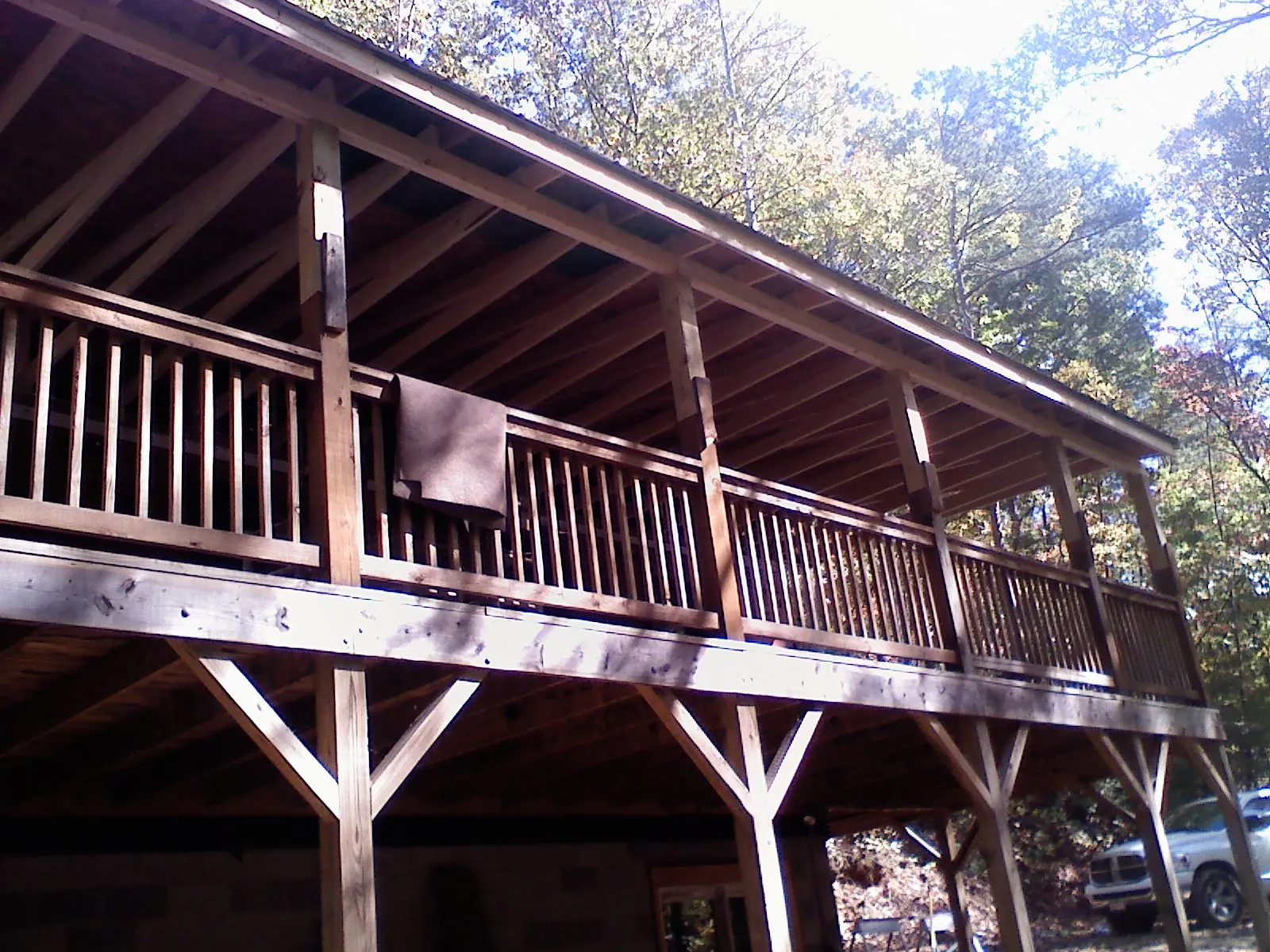 Timber framing under a new elevated porch and deck — Roof Leak Repair in Metamora by Roofing Brothers